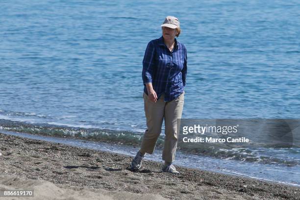 German Chancellor Angela Merkel, with her husband, take a walk to the sea, during the Easter holidays on the island of Ischia.