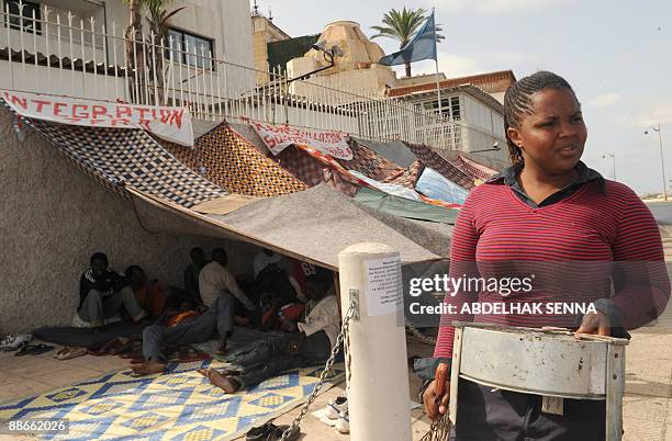 Group of 50 Subsaharan refugees stage a sit-in under a makeshift shelter in front of the UN High Commissioner for refugees office in Rabat on June...
