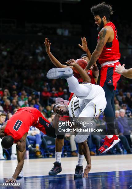Gibbs of the Notre Dame Fighting Irish falls to the ground after shooting against the Ball State Cardinals at Purcell Pavilion on December 5, 2017 in...