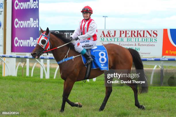 Dunno ridden by Brooke Sweeney returns to the mounting yard after winning the CrownBet F&M BM58 Handicap on December 05, 2017 in Wangaratta,...