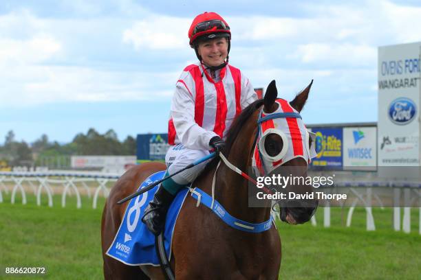 Dunno ridden by Brooke Sweeney returns to the mounting yard after winning the CrownBet F&M BM58 Handicap on December 05, 2017 in Wangaratta,...