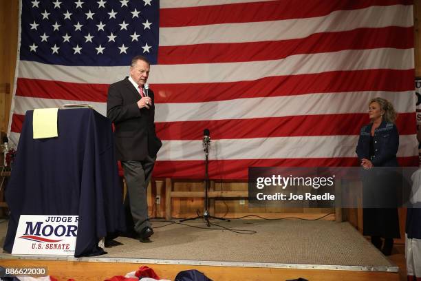 Republican Senatorial candidate Roy Moore speaks as his wife Kayla Moore looks on during a campaign event at Oak Hollow Farm on December 5, 2017 in...