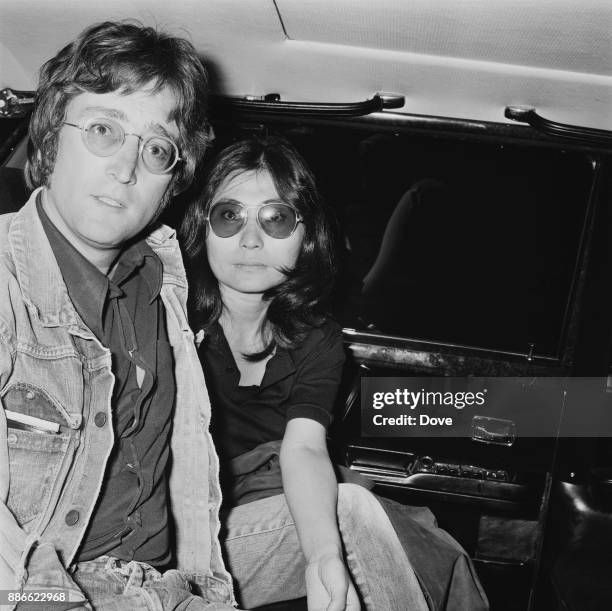 British singer-songwriter and musician John Lennon with wife Yoko Ono at Heathrow airport, London, UK, 10th May 1971.