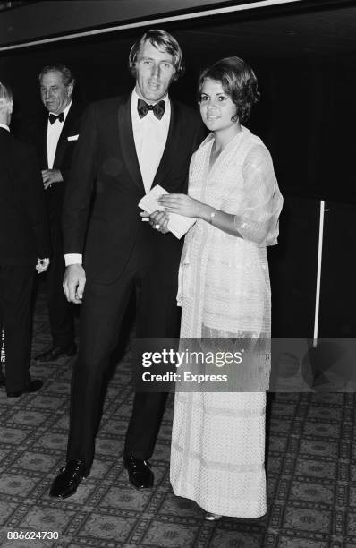 Australian tennis players Evonne Goolagong and Colin Dibley attending a formal event at Grosvenor House, London, UK, 5th July 1971.