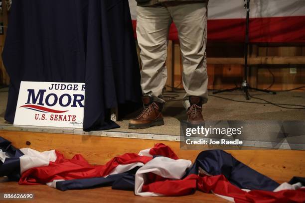 Steve Bannon boots are seen as he speaks before introducing Republican Senatorial candidate Roy Moore during a campaign event at Oak Hollow Farm on...