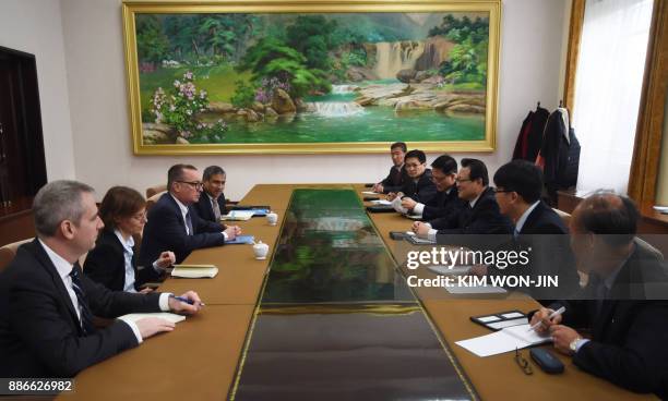 Senior United Nations official Jeffrey Feltman speaks with North Korean Vice Foreign Minister Pak Myong Guk at the People's Palace of Culture in...