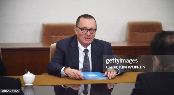 Senior United Nations official Jeffrey Feltman speaks with North Korean Vice Foreign Minister Pak Myong Guk at the People's Palace of Culture in...