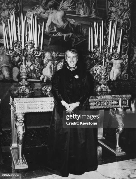 American author and politician Clare Boothe Luce in the Throne Hall at Castel Gandolfo, Italy, 1949. She was received there by Pope Pius XII after...