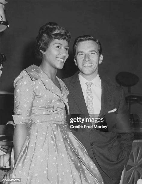 English jazz singer Maxine Daniels and pop singer Dennis Lotis at the Lime Grove Studios in London during rehearsals for the BBC television programme...