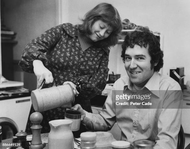 British activist and President of the Young Liberals Peter Hain, having breakfast with his wife Patricia at their home in Putney, London, before his...