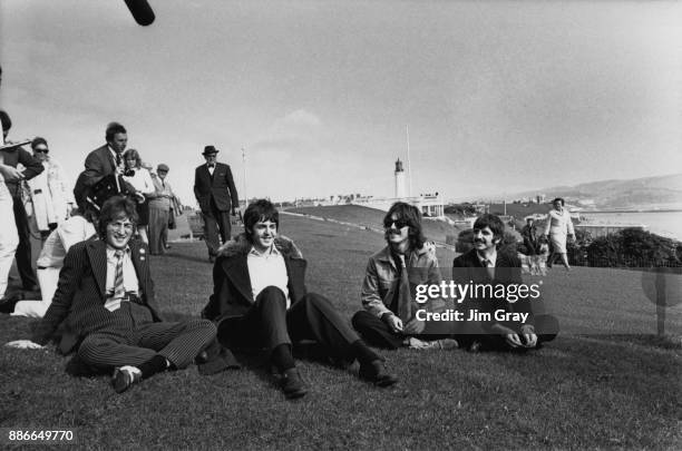 English rock band the Beatles during the filming of 'Magical Mystery Tour' in Plymouth, UK, 12th September 1967. From left to right, they are John...