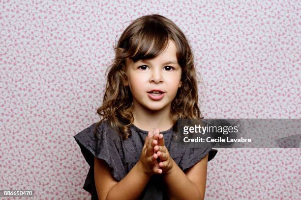 portrait of a little girl chatting - cute five year old stock pictures, royalty-free photos & images