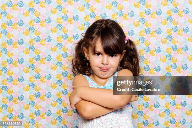 little girl sulking - grumpy stockfoto's en -beelden