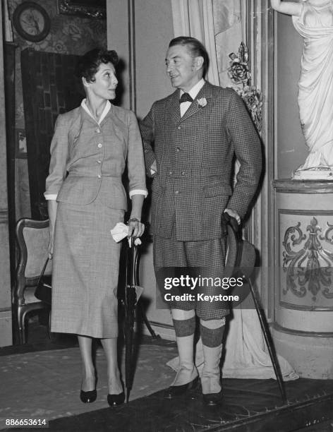 English actor Clive Brook with his actress daughter Faith Brook , who is visiting him from America, 1st August 1953. Clive, who is starring in 'A...