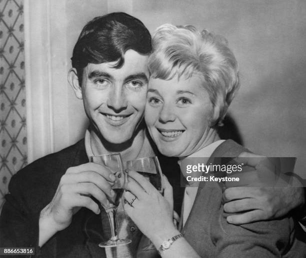 English actor John Alderton with his fiancée, actress Jill Browne, who co-stars with him in the television soap opera 'Emergency - Ward 10', 5th...