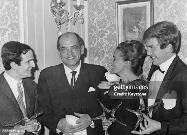 From left to right, François Truffaut , Luis Bunuel , Jeanne Moreau and Albert Finney receive their Étoiles de Cristal awards from the Académie Du...