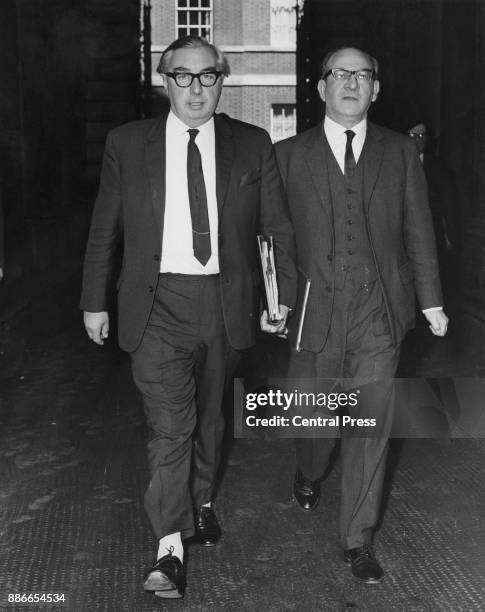 British Foreign Secretary George Brown and Fred Mulley , Minister of State at the Foreign Office, on their way back to the Foreign Office after a...