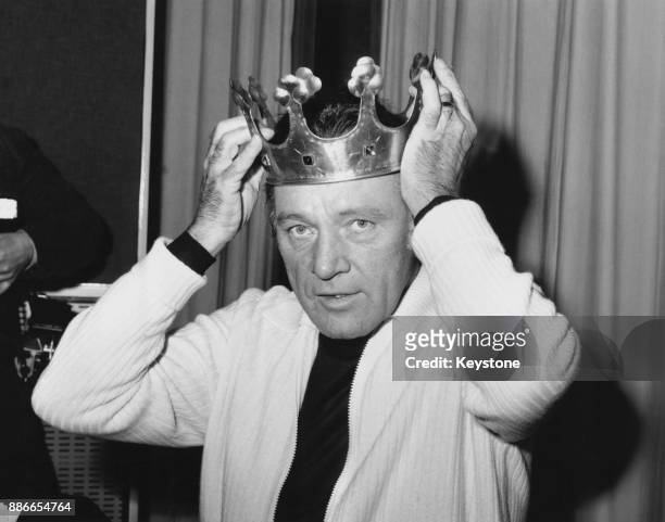 Welsh actor Richard Burton dons the crown for his role as the storyteller in BBC Radio 4's 'Vivat Rex' at Broadcasting House in London, 14th December...