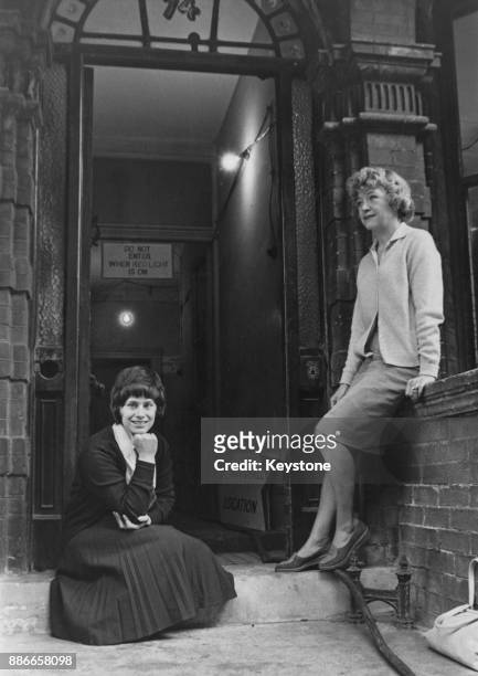 English actresses Dora Bryan and Rita Tushingham outside 74, Fulham Road in Chelsea, London, where they are filming 'A Taste of Honey' for director...