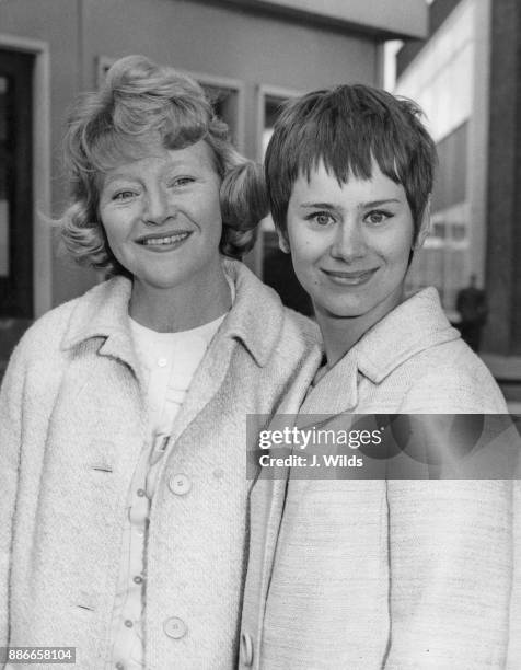 English actresses Dora Bryan and Rita Tushingham leave London Airport for the Cannes Film Festival, where they are presenting the film 'A Taste of...