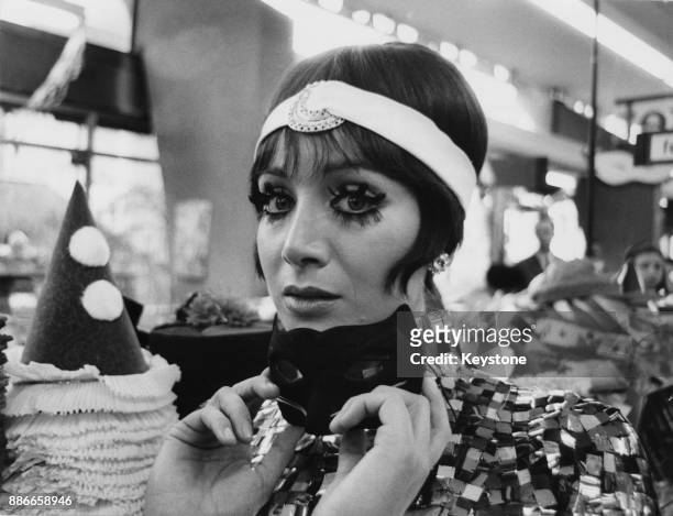 Italian actress Maria Grazia Buccella films a supermarket scene for the film 'Dove vai tutta nuda?' , Italy, 19th January 1969.