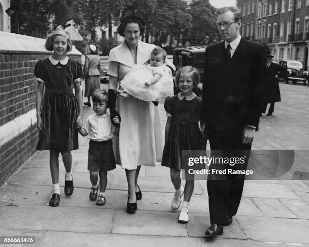 Liberal Party politician Frank Byers leaves St Paul's Church in Knightsbridge, London, after the christening of his daughter Sara Margaret, 14th July...