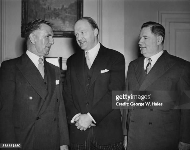 Conservative politician Rab Butler , the Chancellor of the Exchequer, presides over a meeting of the Commonwealth Finance Ministers at the Treasury...