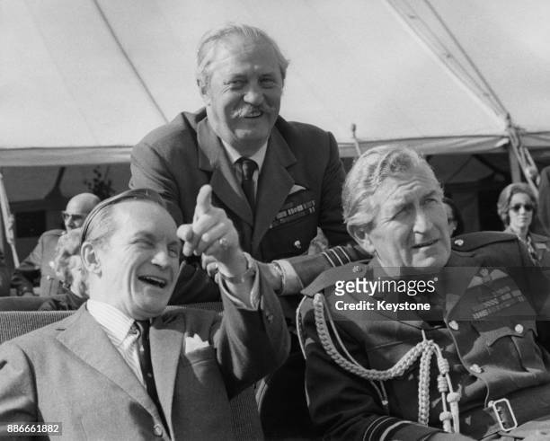 From left to right, Air Marshal Sir Denis Crowley-Milling , controller of the RAF Benevolent Fund, Wing Commander Alan McGregor and Air Marshal Sir...