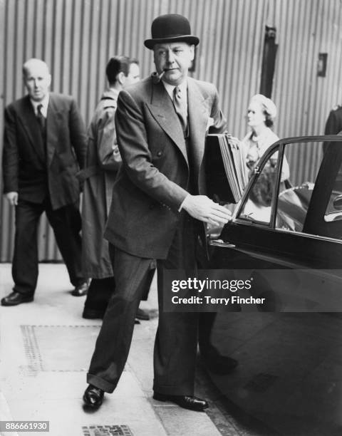 English pathologist Francis Edward Camps arrives at the Old Bailey in London for the second day of the trial of serial killer John Reginald Christie,...