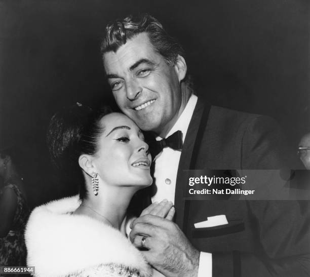 American actor Rory Calhoun with his wife, actress Lita Baron , dancing at the opening of the Cocoanut Grove nightclub in California, USA, 2nd...