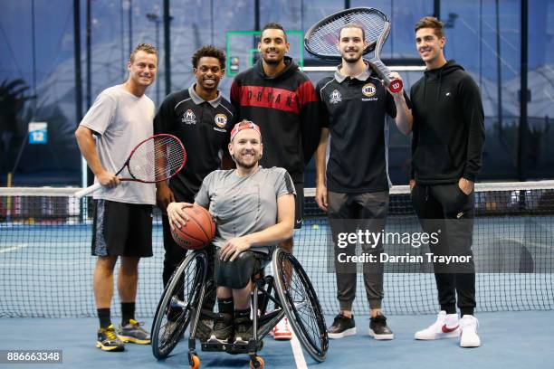 Davis Cup captain Leighton Hewitt poses for a photo with Melbourne United NBL basketballers Chris Goulding and Casper Ware and tennis players Thanasi...