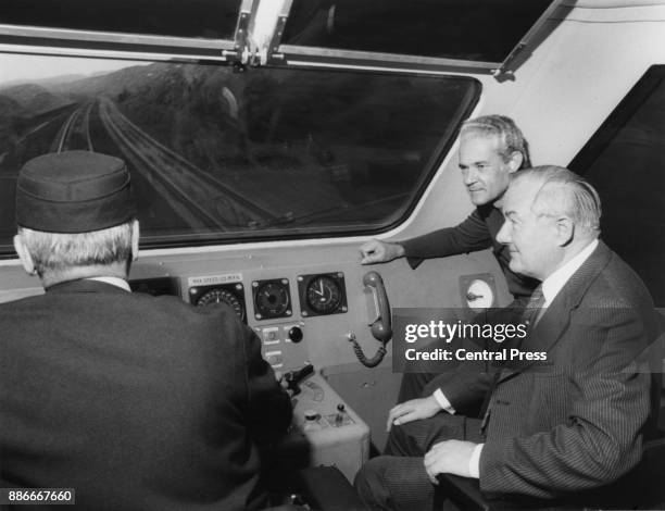 Michael Manley , the Prime Minister of Jamaica, and British Prime Minister James Callaghan in the driving cab of the high speed train which will...