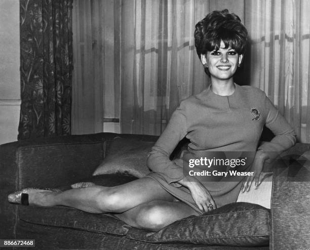 Italian-Tunisian actress Claudia Cardinale at her hotel in London, UK, 1st March 1967. She is in the capital to scout locations for her upcoming film...