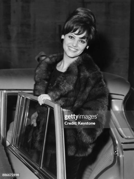 Italian-Tunisian actress Claudia Cardinale attends the premiere of the film '8 ½' in Rome, Italy, February 1963. She stars in the film, which was...