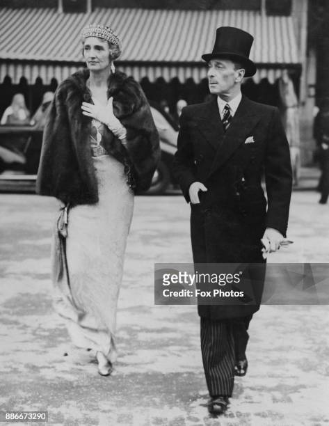 Alexander Mountbatten, 1st Marquess of Carisbrooke and the Marchioness of Carisbrooke leave the House of Lords in London after the State Opening Of...