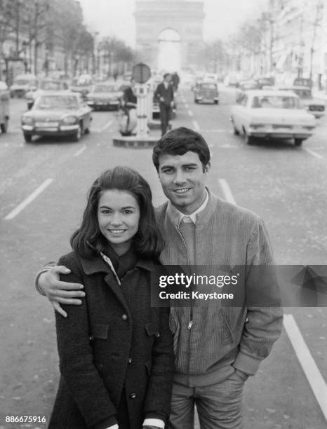 Actors Christine Delaroche and Nino Castelnuovo, the stars of the Vittorio De Sica film 'Un Monde Nouveau', on the Champs-Élysées in Paris, France,...