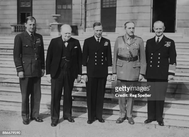 From left to right, Air Marshal Sir Charles Portal of the RAF, British Prime Minister Winston Churchill , King George VI, Field Marshal Sir Alan...