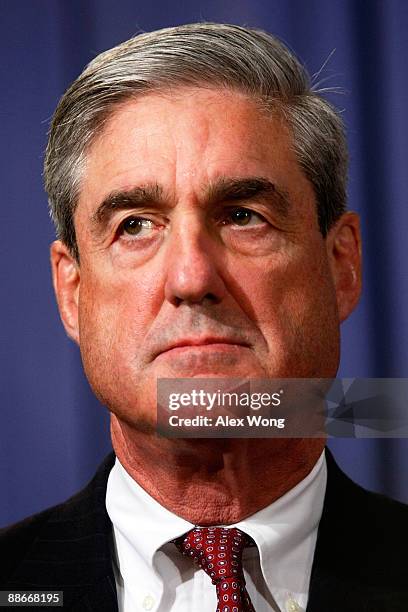 Director Robert Mueller listens during a news conference at the Justice Department June 24, 2009 in Washington, DC. The Justice Department has...