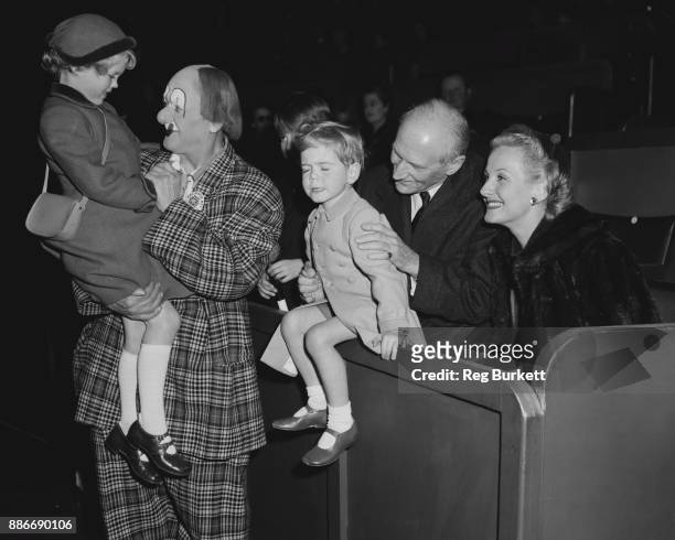 From left to right, Emma Soames, Coco the Clown , Jeremy Soames, Viscount Montgomery , and American cabaret star Connie Moore at the pre-opening...