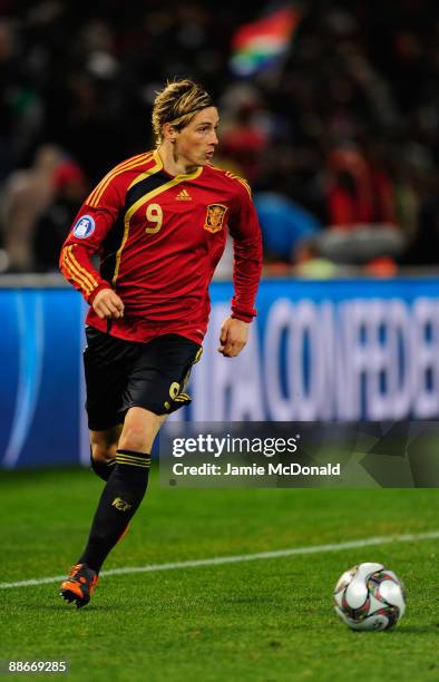 Fernando Torres of Spain runs with the ball during the FIFA Confederations Cup Semi Final match between Spain and USA at Free State Stadium on June...