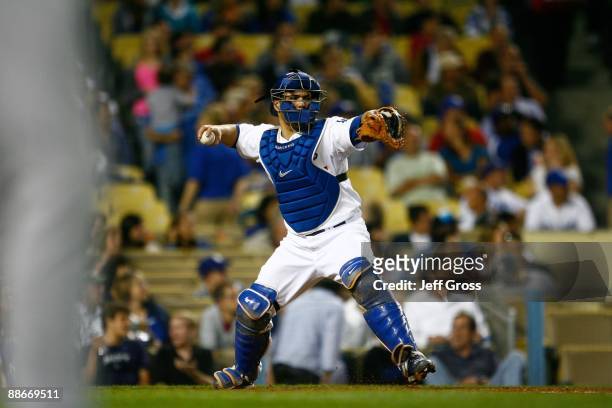 Russell Martin of the Los Angeles Dodgers fields against the Oakland Athletics at Dodger Stadium on June 16, 2009 in Los Angeles, California. The...
