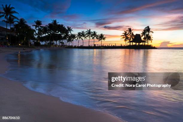beautiful sunset in tanjung aru beach, kota kinabalu beach - kota kinabalu beach stock pictures, royalty-free photos & images