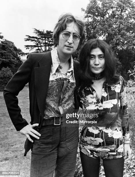 Former member of The Beatles pop group John Lennon pictured with his wife Yoko Ono at their Tittenhurst home near Ascot, Berkshire, shortly before...