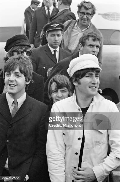 The Beatles return to England, from Spain, London Heathrow Airport, Sunday 4th July 1965. Mal Evans is top right Picture taken 4th July 1965.