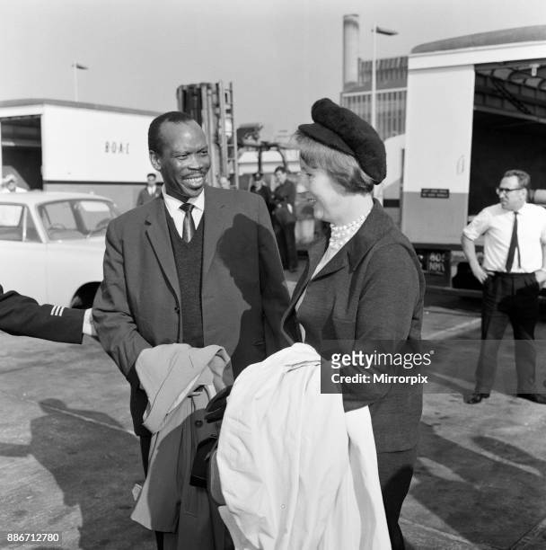 Prime Minister of Bechuanaland, Seretse Khama, and his wife Ruth Williams Khama arriving at London Airport from South Africa, 20th October 1965.