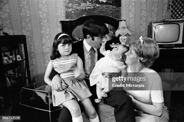 Jimmy Tarbuck in Great Yarmouth with his wife Pauline and their daughters Cheryl and Liza, 7 months. Jimmy didn't know for sure at 4pm if he was...