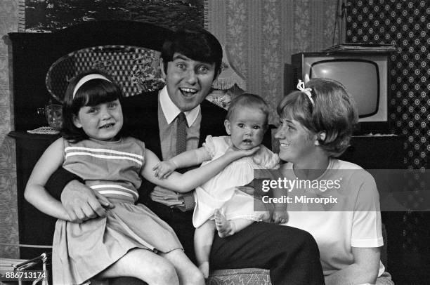 Jimmy Tarbuck in Great Yarmouth with his wife Pauline and their daughters Cheryl and Liza, 7 months. Jimmy didn't know for sure at 4pm if he was...