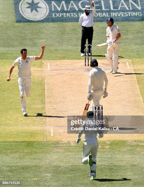 Mitchell Starc of Australia celebrates after taking the wicket of Craig Overton of England during day five of the Second Test match during the...