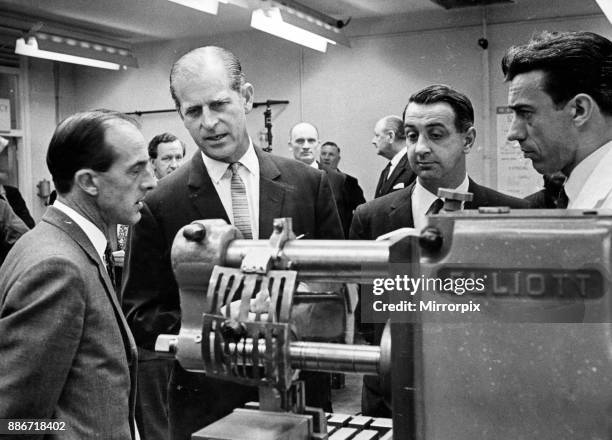 Leslie Jenkins talks to Prince Philip, Duke of Edinburgh, during his tour of the Government Training Centre, Llanelli, 28th June 1968.