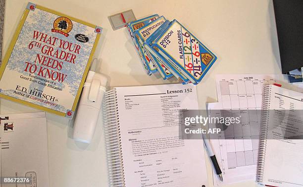 Karin Zeitvogel "US-EDUCATION-FAMILY" Teaching aids, exercise books, bills and a daily schedule rest on the desk of homeschooling mother Lisa Dean's...